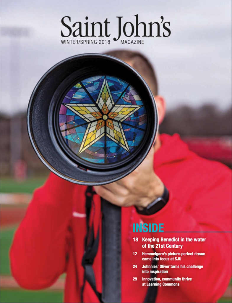 Magazine cover titled "Saint John's Winter/Spring 2018." Features a person holding a telescope with a colorful stained glass star design on the lens cap. The background is blurred. Several article titles are listed below.